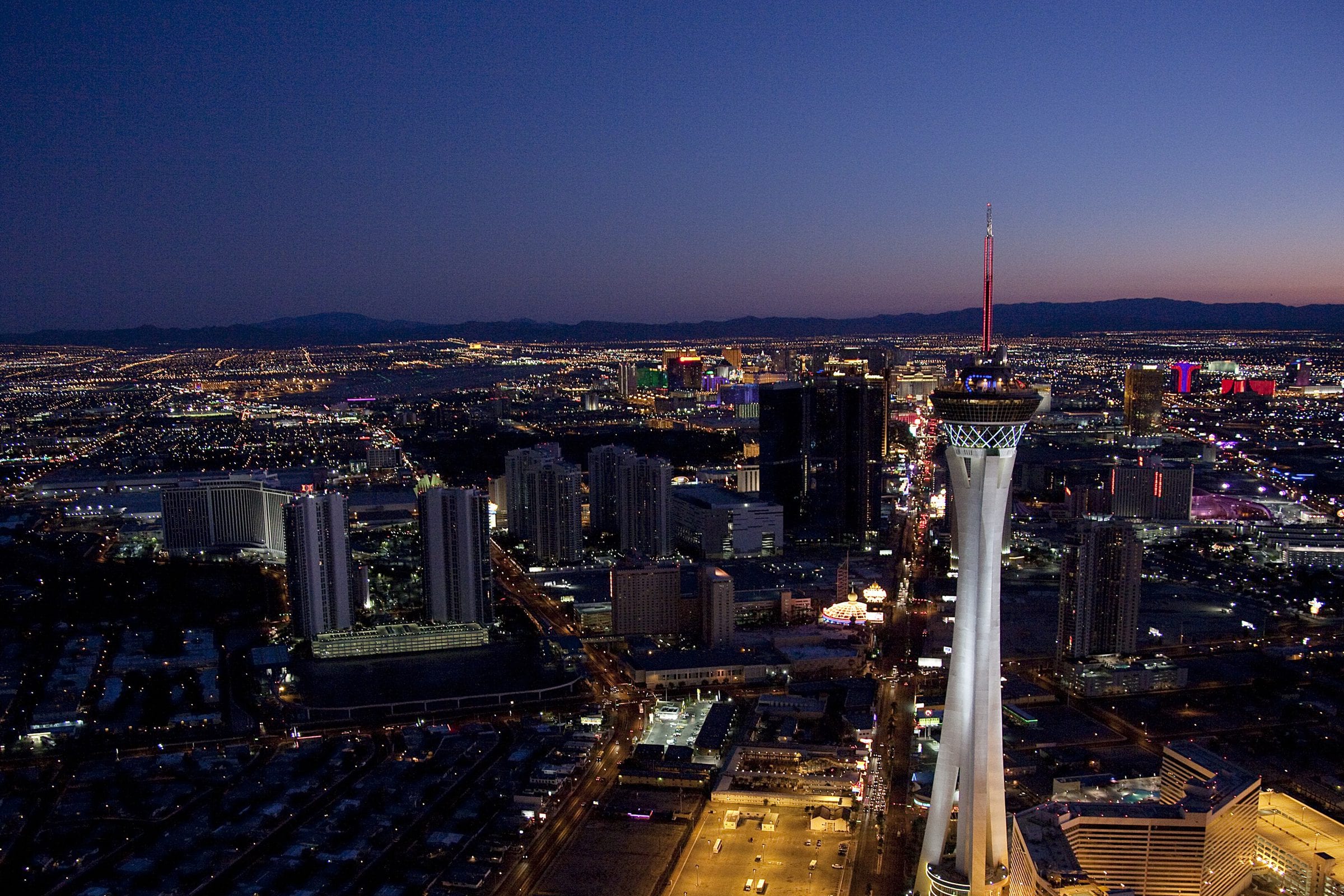 The Las Vegas Strip corridor seen from the air, at blue hour.